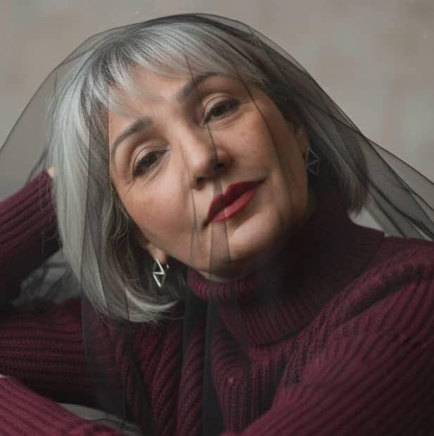 Mitra, 57