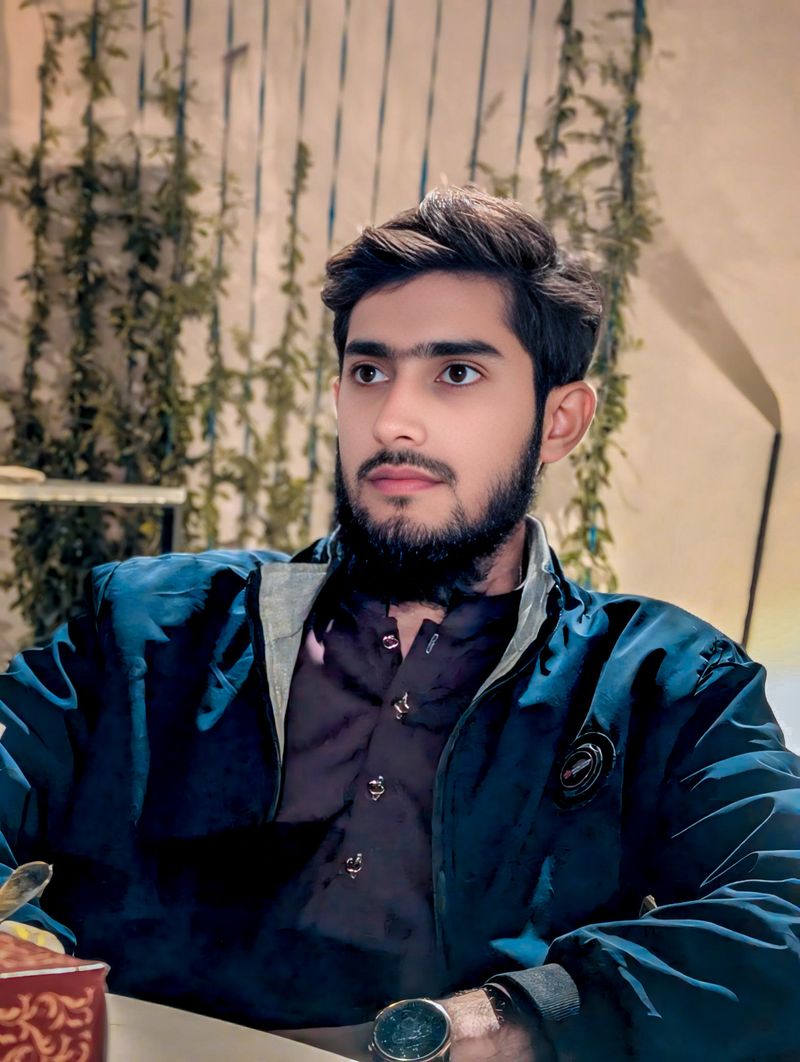 M Muzamil, 18